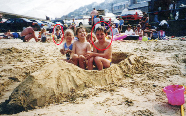 This picture taken 19 years shows Aimee Maiden (circled left) and Nick Wheeler (circled right) at Mousehole beach, Cornwall. A couple browsing old family photo albums ahead of their wedding were shocked to find a picture of themselves playing together on a beach - as CHILDREN. See SWNS Story SWPHOTO. Teacher Aimee Maiden, 25, and her soldier husband Nick Wheeler, 26, had no idea their paths had crossed until they saw the grainy snap taken 20 years earlier. Aimee grew up in the tiny seaside village of Mousehole, Cornwall, and was a regular visitor to the beach - while Nick lived in KENT but just happened to be on holiday there. The two kids, Aimee aged five and Nick aged six, spent the day building sand castles just a few yards apart but their two families never met or spoke. Nick moved to Cornwall a year later but didn't meet 'soulmate' Aimee again till they went to the same sixth form college and fell in love. But they knew nothing about their chance childhood meeting until they began going through old family photos at Nick's grandparents' house ahead of their engagement party last year. They came across the shot of Nick playing on the beach with his sister and cousins when shocked Aimee suddenly recognised herself in the background. 31 July 2014
